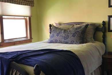 Example of a farmhouse bedroom design in Burlington