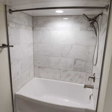 New tub and tile with curved shower curtain rod