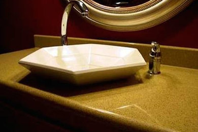 Bathroom - mid-sized bathroom idea in Atlanta with a vessel sink and quartz countertops