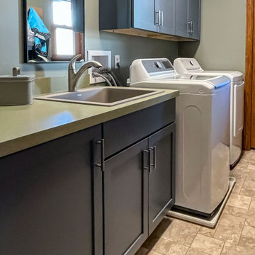 Updated Laundry Room with Stormy Medium-Blue Cabinets