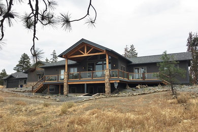 Mid-sized craftsman brown two-story concrete fiberboard gable roof idea in Portland