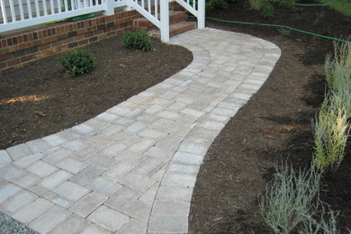 Design ideas for a small traditional front yard garden in Richmond with a garden path and concrete pavers.