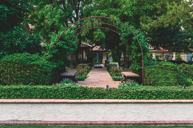 Inspiration for a mediterranean backyard formal garden in Phoenix.