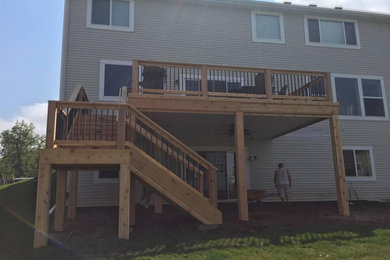 Deck - mid-sized backyard deck idea in Minneapolis