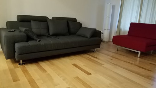 Which Color Rug Goes Well With Grey Couch And Red Chair
