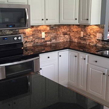 Black Pearl Granite and Supreme Stackstone Silver Backsplash