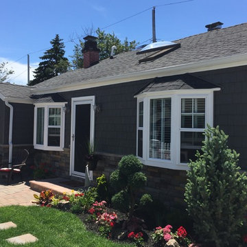 Long Beach Siding - Charcoal Smoke with Sterling Tight Cut Stone & Windows