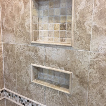 Tan Shower with Decorative Tile Insert