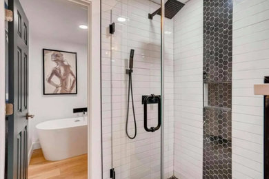 Example of a transitional bathroom design in Denver