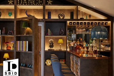 Medium sized eclectic home bar in Surrey.