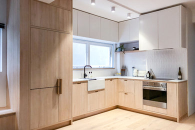 Photo of a small scandinavian kitchen in Sydney.