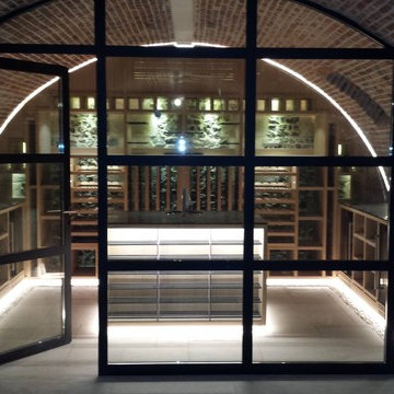 LA REVUE DU VIN DE FRANCE - wine cellar in the basement of a Norman manor