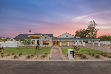 Huge contemporary white two-story mixed siding gable roof idea in Phoenix