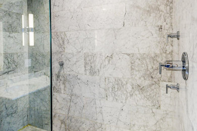 Mid-sized trendy master white tile and marble tile marble floor, white floor and double-sink bathroom photo in Baltimore with shaker cabinets, dark wood cabinets, beige walls, an undermount sink, marble countertops, white countertops and a freestanding vanity