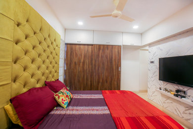 Transitional bedroom photo in Mumbai
