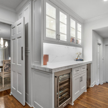 Chic Modern Eat-In Kitchen with Integrated Home Bar and Organic Accents