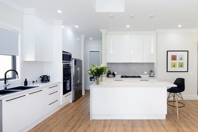 This is an example of a modern kitchen in Newcastle - Maitland.