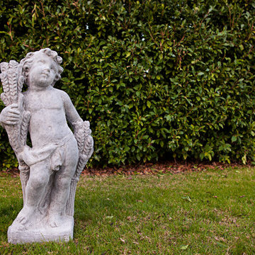 Fall Cherub Statue