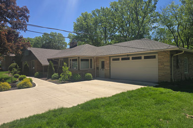 Example of an exterior home design in Cleveland