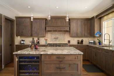 Mid-sized transitional l-shaped medium tone wood floor eat-in kitchen photo in San Diego with a single-bowl sink, shaker cabinets, gray cabinets, granite countertops, multicolored backsplash, marble backsplash, stainless steel appliances and an island