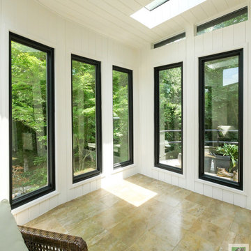 Sunroom-Like Space with New Black Windows - Renewal by Andersen Georgia