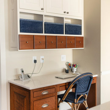 Cherry Wood Desk & White Wall Cabinets