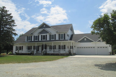 Example of a cottage exterior home design in Other