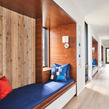 Custom Window Seat Hallway in a Figure Eight Island Home