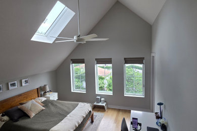 Example of a minimalist bedroom design in Chicago