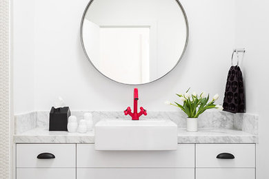Inspiration for a small contemporary 3/4 bathroom in San Francisco with flat-panel cabinets, white cabinets, white walls, slate floors, a vessel sink, marble benchtops and black floor.