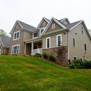 Traditional Midwestern home sitting on rolling hills