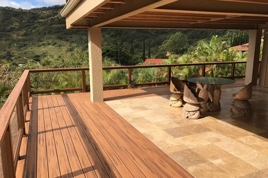 Deck - large tropical backyard deck idea in Hawaii with a roof extension