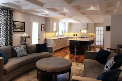 Living room - mid-sized contemporary open concept dark wood floor and brown floor living room idea in Other with gray walls and a wall-mounted tv