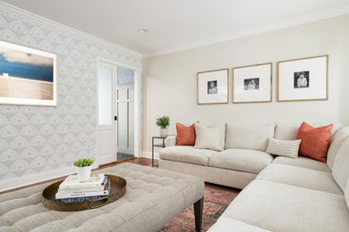 Example of a small transitional enclosed dark wood floor family room design in Philadelphia with beige walls and a wall-mounted tv