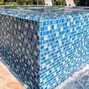 Gorgeous Glass Tile 360 Spillover Spa and lap pool