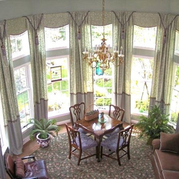 Circular window area drapery treatment