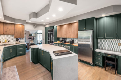 Eat-in kitchen - large transitional eat-in kitchen idea in Columbus with shaker cabinets, quartz countertops and an island