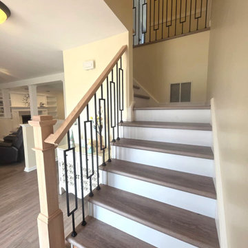 Indoor Railing Installation with Red Oak T-Rail, Box Newels & Black Window Balus