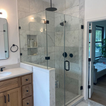 Marble tiled walk-in shower in Master Bathroom