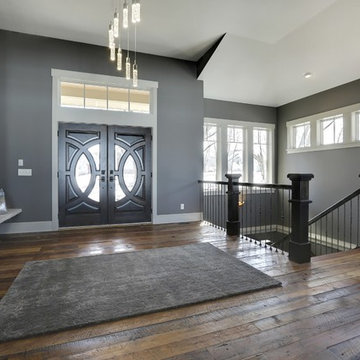 Weathered Antique Flooring in a Contemporary Entryway