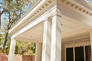 Patio - backyard patio idea in Atlanta with a roof extension