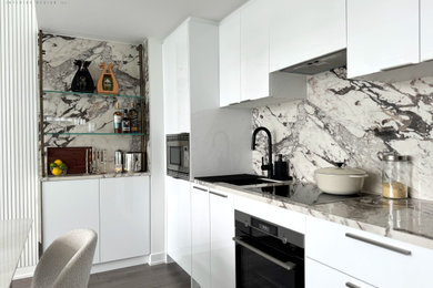 Inspiration for a small transitional kitchen remodel in Toronto with porcelain backsplash