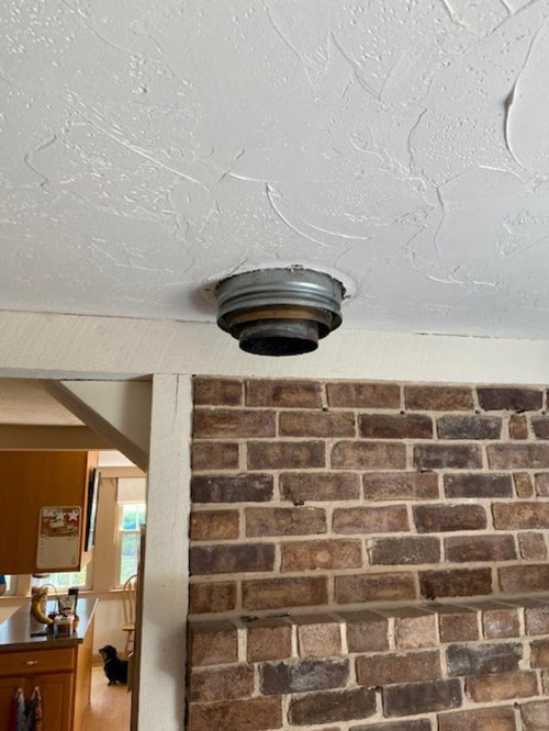How to repair a wood stove pipe hole in ceiling?
