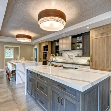 Transitional Kitchen with an Industrial Edge and Double Islands