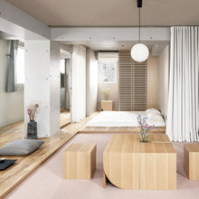 建築途中でホテルから居住用に。曲線と土間のあるスタイリッシュな賃貸住宅