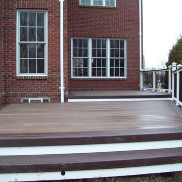 TREX TRANSCENDS SPICED RUM WITH VINTAGE LANTERN BORDER & WHITE TREX RAILING
