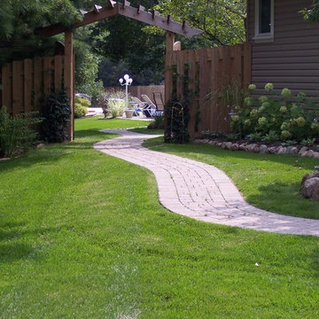 Deck, Paved Walkway, and Landscaping