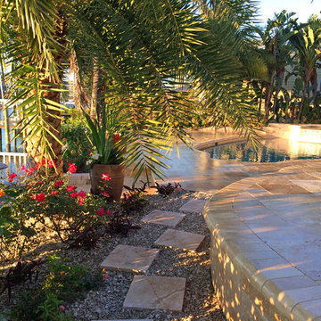 Backyard transformation features a new Travertine deck