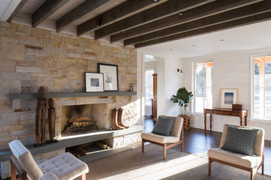 Inspiration for a farmhouse formal and open concept dark wood floor living room remodel in New York with a standard fireplace, a stone fireplace and no tv
