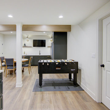 Warm & Inviting Basement Retreat with Kitchenette and Reading Nook
